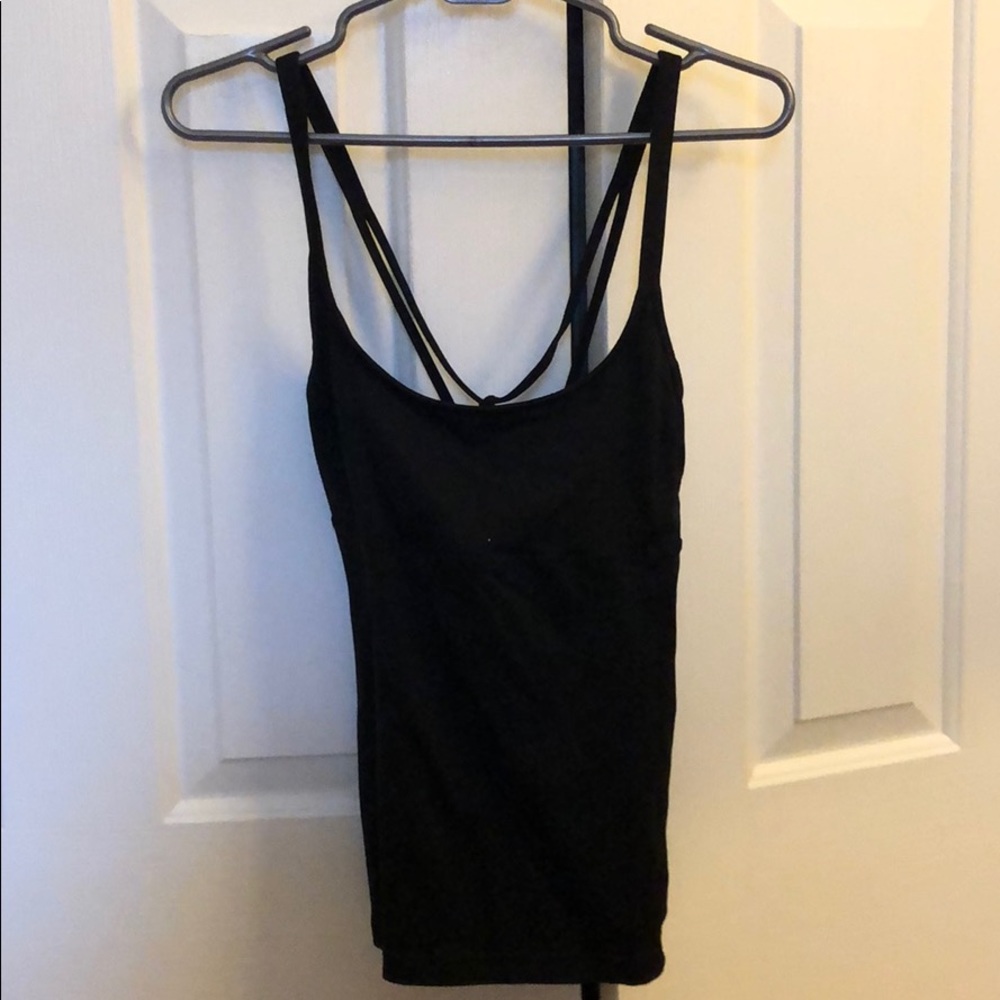 Tight black alo yoga tank top with cross back